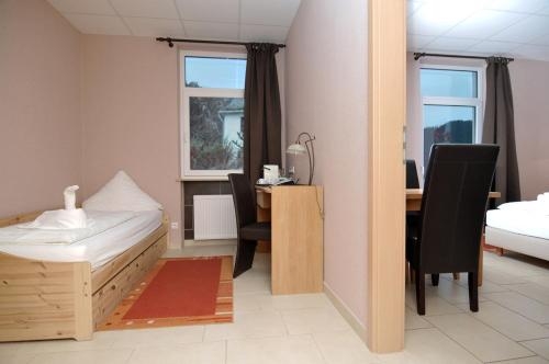 Imagen de la habitación del Hotel Winzerhaus Gaertner An Der Loreley. Foto 8
