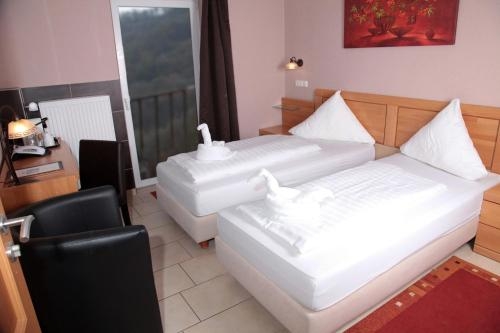 Imagen de la habitación del Hotel Winzerhaus Gaertner An Der Loreley. Foto 9