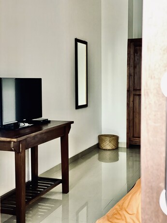 Imagen de la habitación del Hotel Wiras Village. Foto 11