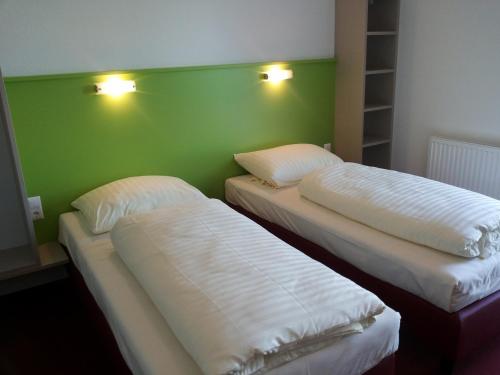 Imagen de la habitación del Hotel Wirt im Feld. Foto 17