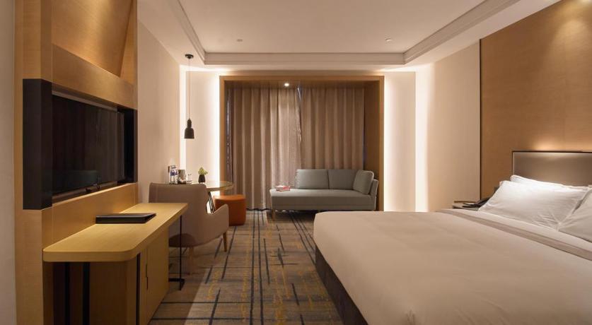 Imagen de la habitación del Hotel Wisdom Rose Hotel Shanghai. Foto 12
