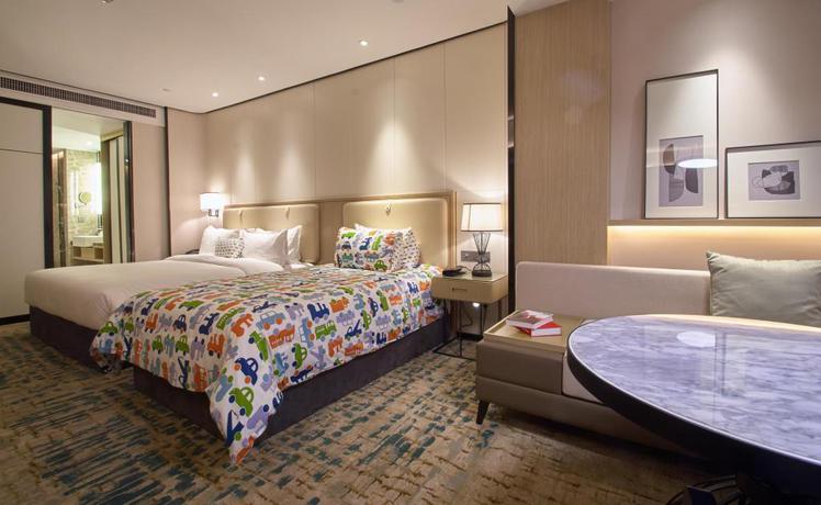 Imagen de la habitación del Hotel Wisdom Rose Hotel Shanghai. Foto 13