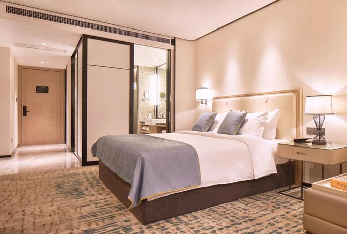 Imagen de la habitación del Hotel Wisdom Rose Hotel Shanghai. Foto 14