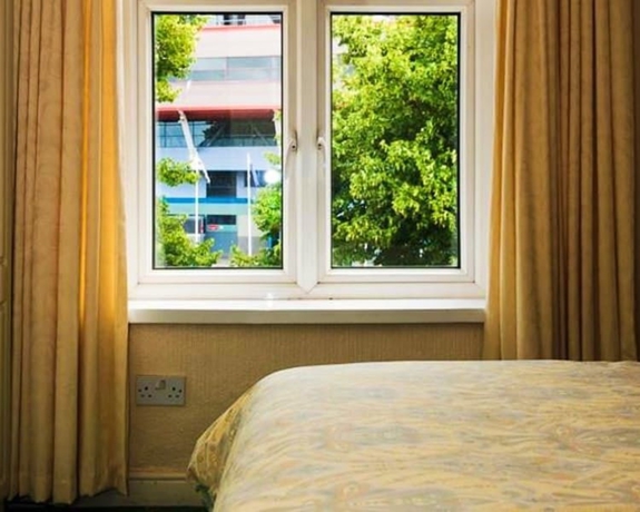 Imagen de la habitación del Hotel WiseStay. Foto 8