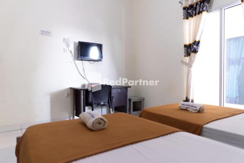 Imagen general del Hotel Wisma Aini Syariah Mitra RedDoorz. Foto 9