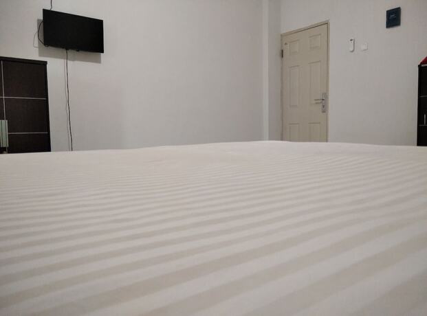 Imagen de la habitación del Hotel Wisma Anton Soedjarwo. Foto 18