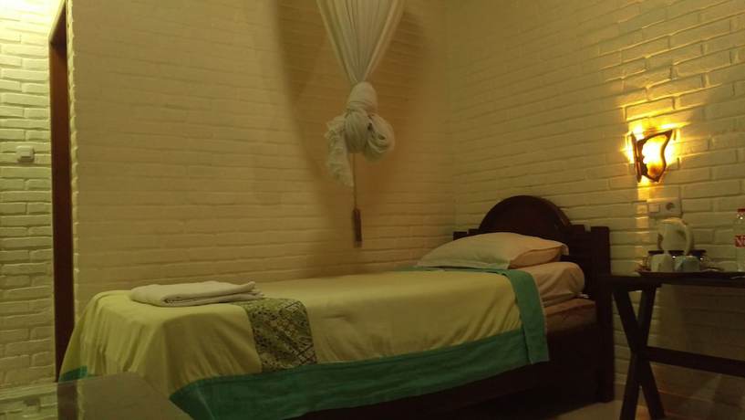 Imagen de la habitación del Hotel Wisma Ary's Hotel. Foto 11
