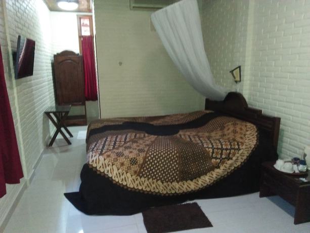 Imagen de la habitación del Hotel Wisma Ary's Hotel. Foto 13