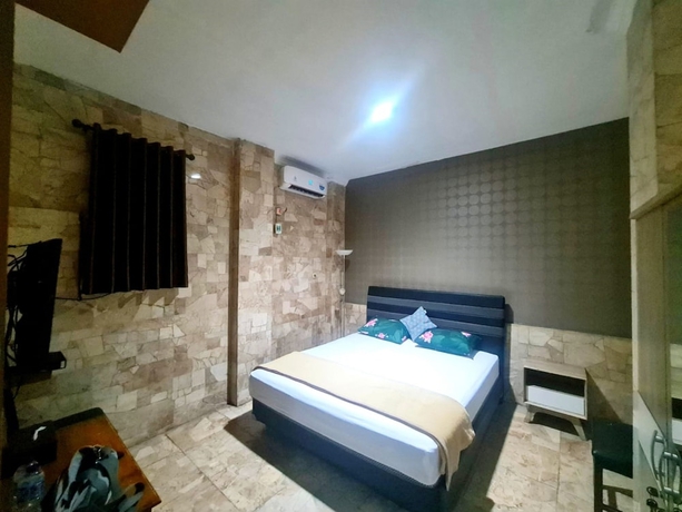 Imagen de la habitación del Hotel Wisma Asia Busindo Syariah. Foto 3