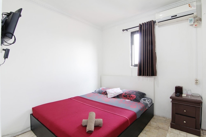 Imagen de la habitación del Hotel Wisma Asia Busindo Syariah. Foto 5