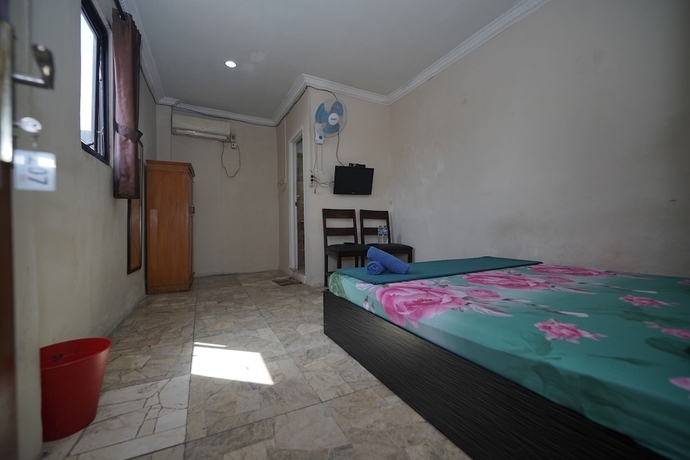 Imagen de la habitación del Hotel Wisma Asia Busindo Syariah. Foto 6