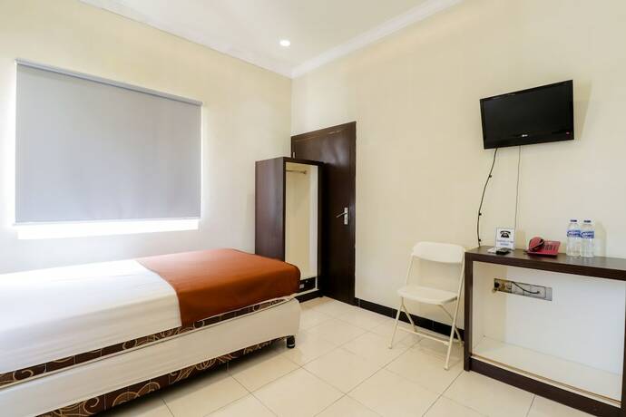 Imagen de la habitación del Hotel Wisma Banda. Foto 3