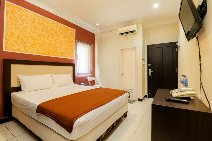 Imagen de la habitación del Hotel Wisma Banda. Foto 8
