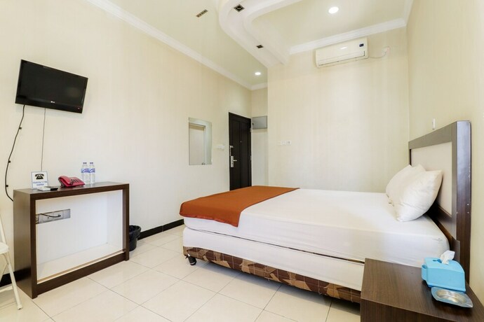 Imagen de la habitación del Hotel Wisma Banda. Foto 9