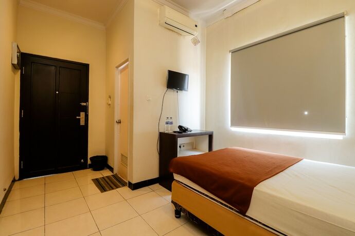 Imagen de la habitación del Hotel Wisma Banda. Foto 12