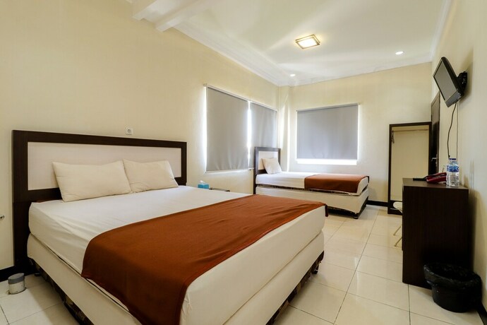 Imagen de la habitación del Hotel Wisma Banda. Foto 13