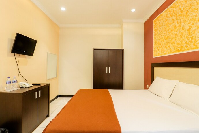 Imagen de la habitación del Hotel Wisma Banda. Foto 15