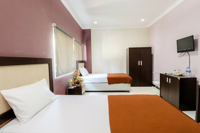 Imagen de la habitación del Hotel Wisma Banda. Foto 18