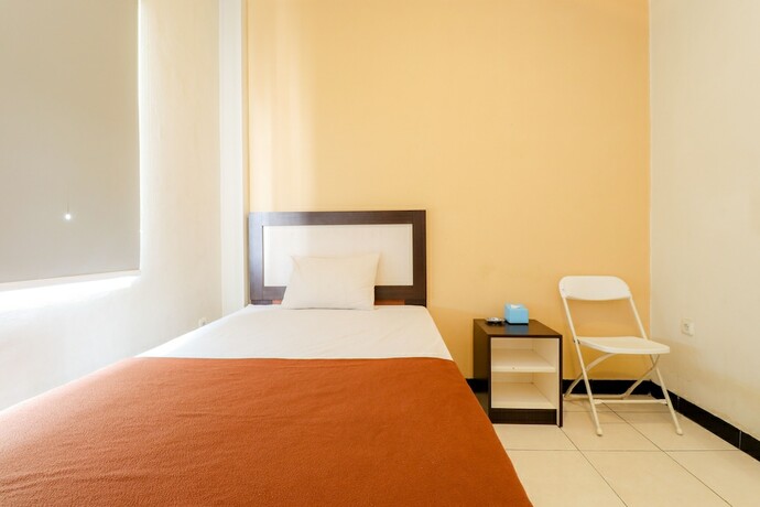 Imagen de la habitación del Hotel Wisma Banda. Foto 19