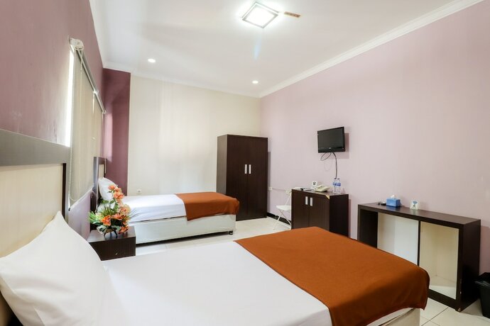 Imagen de la habitación del Hotel Wisma Banda. Foto 20