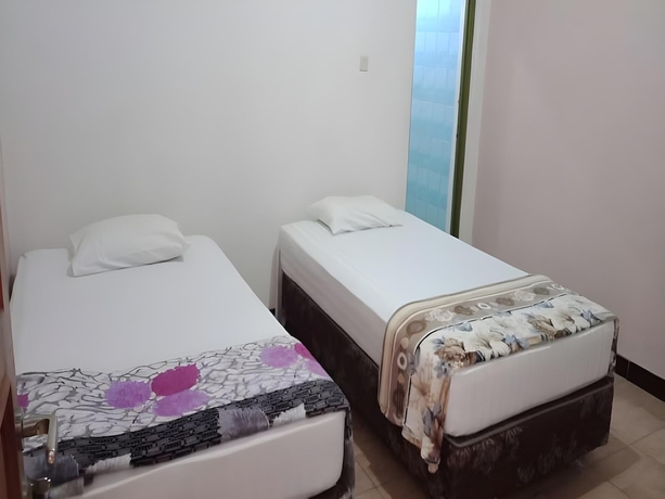 Imagen de la habitación del Hotel Wisma CK Kebumen by Cozzy. Foto 7