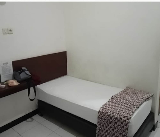 Imagen de la habitación del Hotel Wisma CK Kebumen by Cozzy. Foto 9