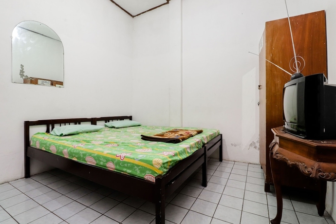 Imagen de la habitación del Hotel Wisma Joyo. Foto 4