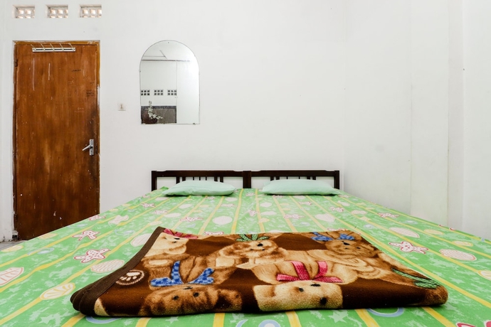 Imagen de la habitación del Hotel Wisma Joyo. Foto 5