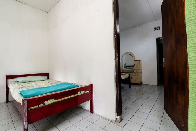 Imagen de la habitación del Hotel Wisma Joyo. Foto 7