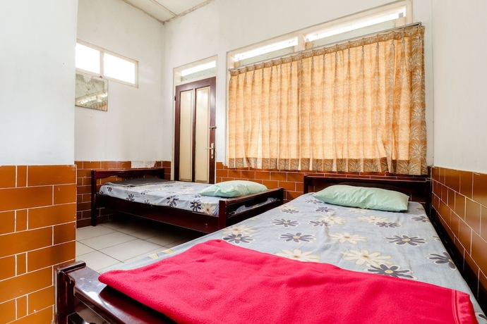 Imagen de la habitación del Hotel Wisma Joyo. Foto 8