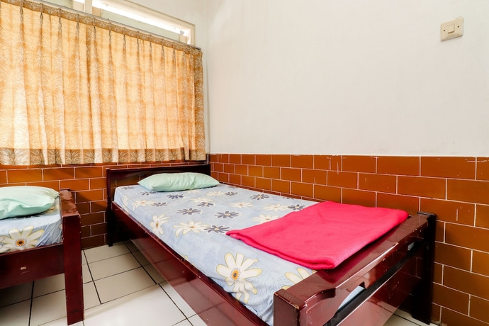 Imagen de la habitación del Hotel Wisma Joyo. Foto 9