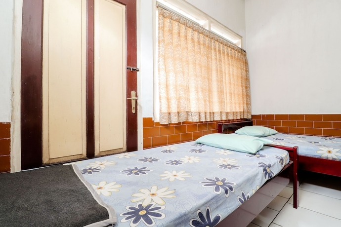 Imagen de la habitación del Hotel Wisma Joyo. Foto 12