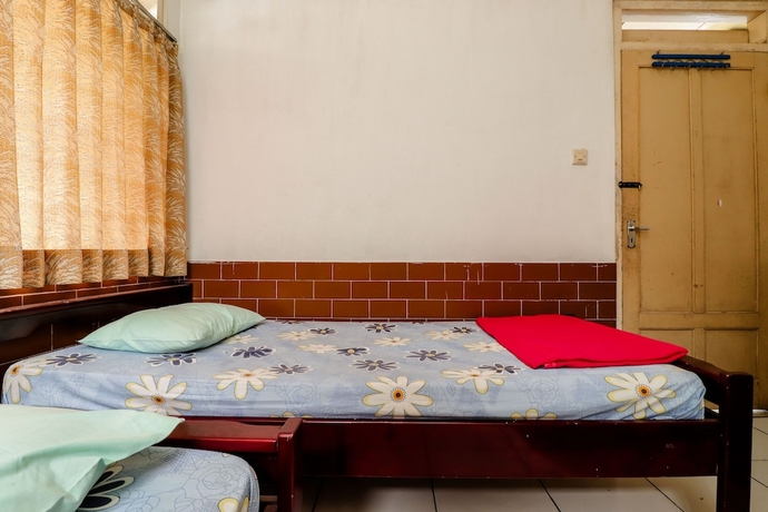 Imagen de la habitación del Hotel Wisma Joyo. Foto 14