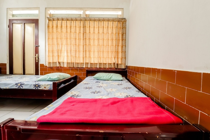 Imagen de la habitación del Hotel Wisma Joyo. Foto 16