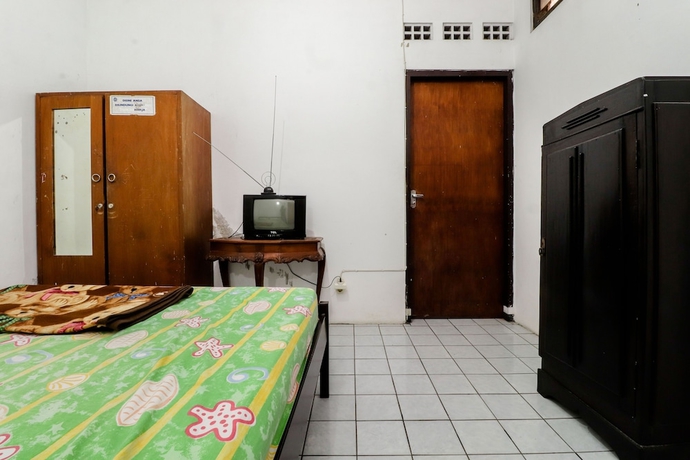 Imagen de la habitación del Hotel Wisma Joyo. Foto 17