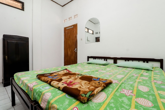 Imagen de la habitación del Hotel Wisma Joyo. Foto 18