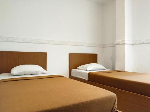 Imagen de la habitación del Hotel Wisma Juanda Powered by Cocotel. Foto 20