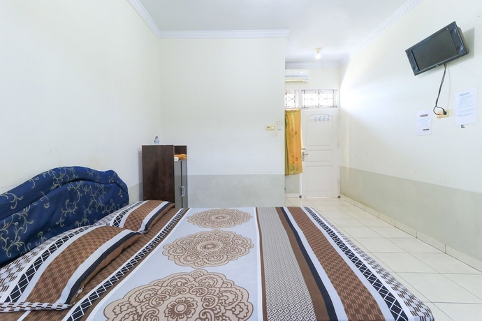Imagen de la habitación del Hotel Wisma Lanraki. Foto 2