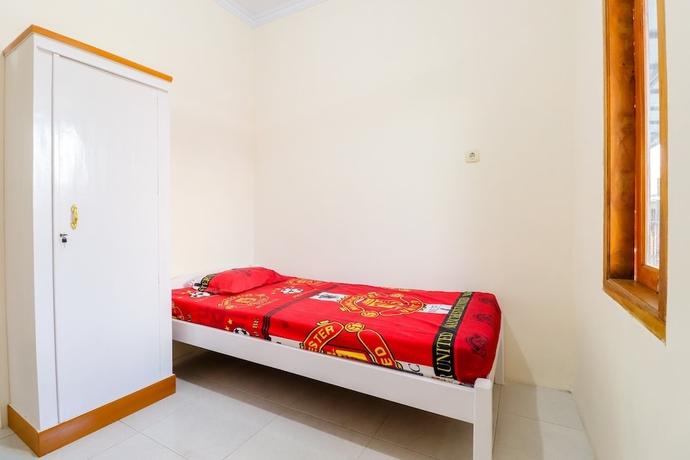 Imagen de la habitación del Hotel Wisma Lee A Lee. Foto 2