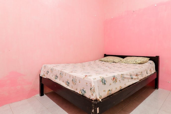 Imagen de la habitación del Hotel Wisma Lee A Lee. Foto 4