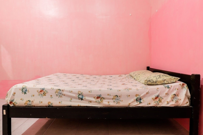 Imagen de la habitación del Hotel Wisma Lee A Lee. Foto 5