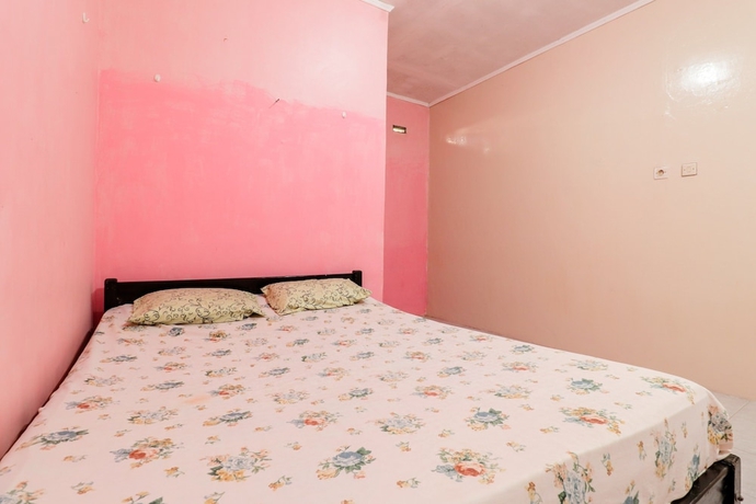 Imagen de la habitación del Hotel Wisma Lee A Lee. Foto 6