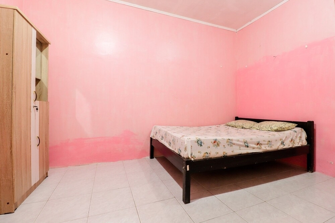 Imagen de la habitación del Hotel Wisma Lee A Lee. Foto 8