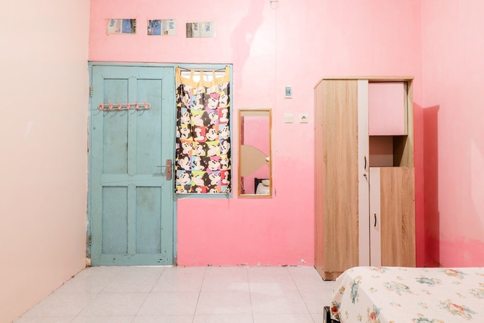 Imagen de la habitación del Hotel Wisma Lee A Lee. Foto 9