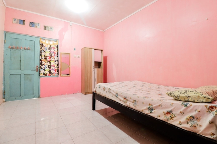 Imagen de la habitación del Hotel Wisma Lee A Lee. Foto 10