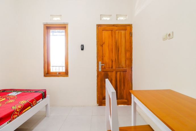 Imagen de la habitación del Hotel Wisma Lee A Lee. Foto 12