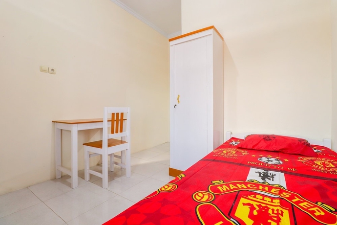 Imagen de la habitación del Hotel Wisma Lee A Lee. Foto 14