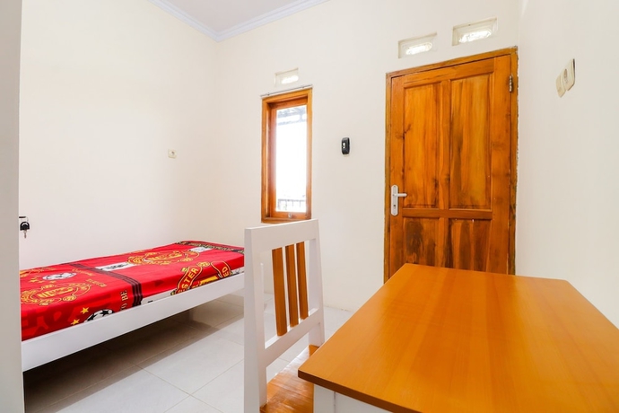 Imagen de la habitación del Hotel Wisma Lee A Lee. Foto 15