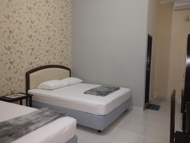 Imagen de la habitación del Hotel Wisma Liontine. Foto 9