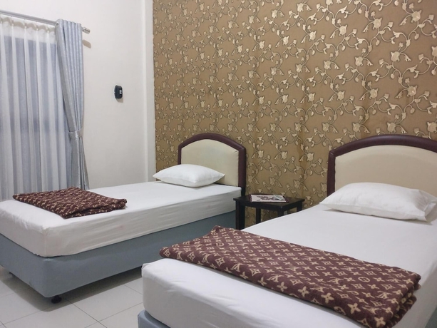 Imagen de la habitación del Hotel Wisma Liontine. Foto 10